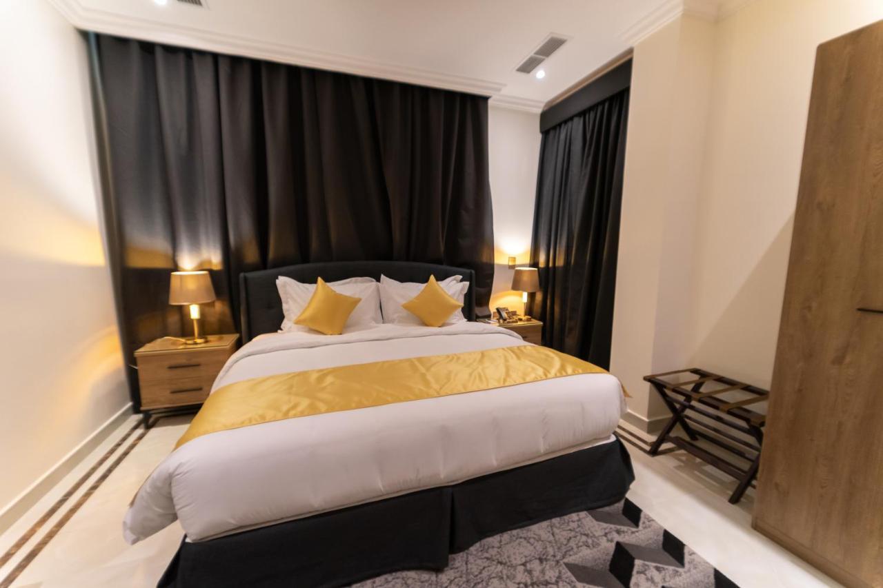 The Gate Hotel And Apartments Дамам Екстериор снимка